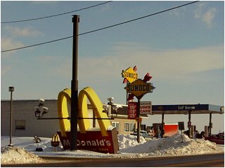 what the?  a sign on the ground?  i've GOT to take a picture of this...